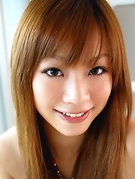 Japanese redhead girl Ayame Sakurai shows her beautiful body