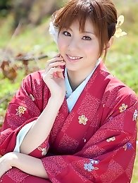 Yuna Asami wearing a beautiful traditional dress covering her big tits