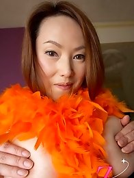 Monster tits Asian milf posing in red lingerie