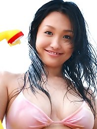 Luscious gravure idol posing with her big busty tits in a bikini