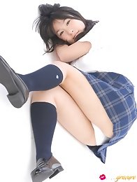 Adorable busty asian school girl lifts up her plaid skirt