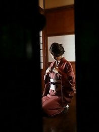 Sexy gravure idol beauty slowly takes off her pink kimono