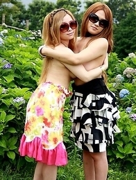 Cute Japanese babes pose outdoors