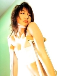 Delicious asian hottie Yoko Kumada dressed in a nurse outfit and a bikini