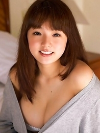 Ai Shinozaki with huge knockers plays with pillows in bed
