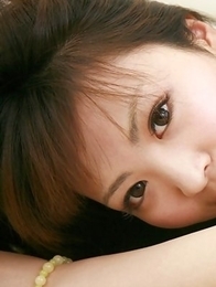 Mayuka Kuroda with cute face shows big hooters in green bra