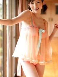 Yuuri Morishita in fluffy lingerie plays with her sexy legs